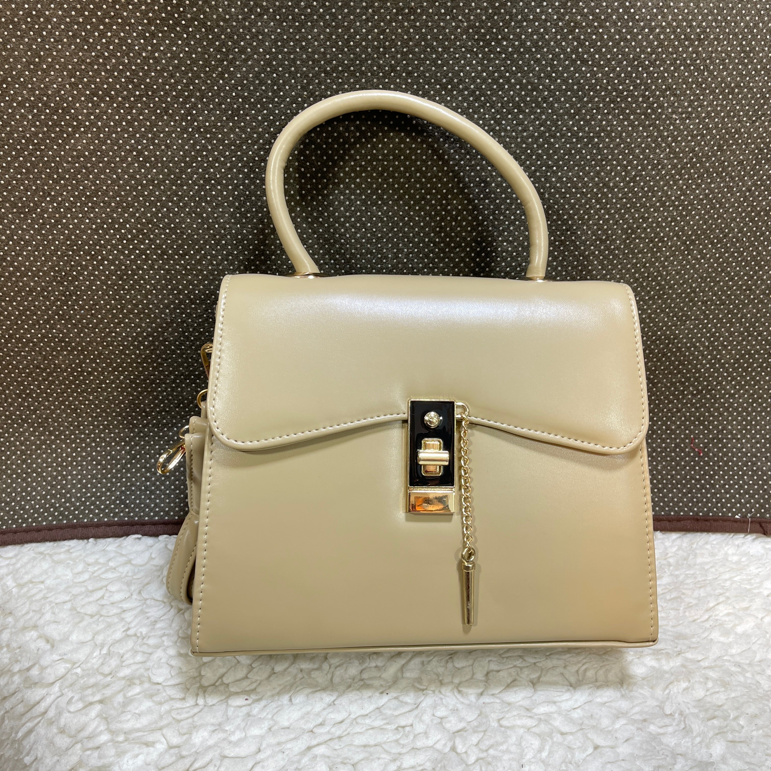 PIN LOCK HANDBAGS
