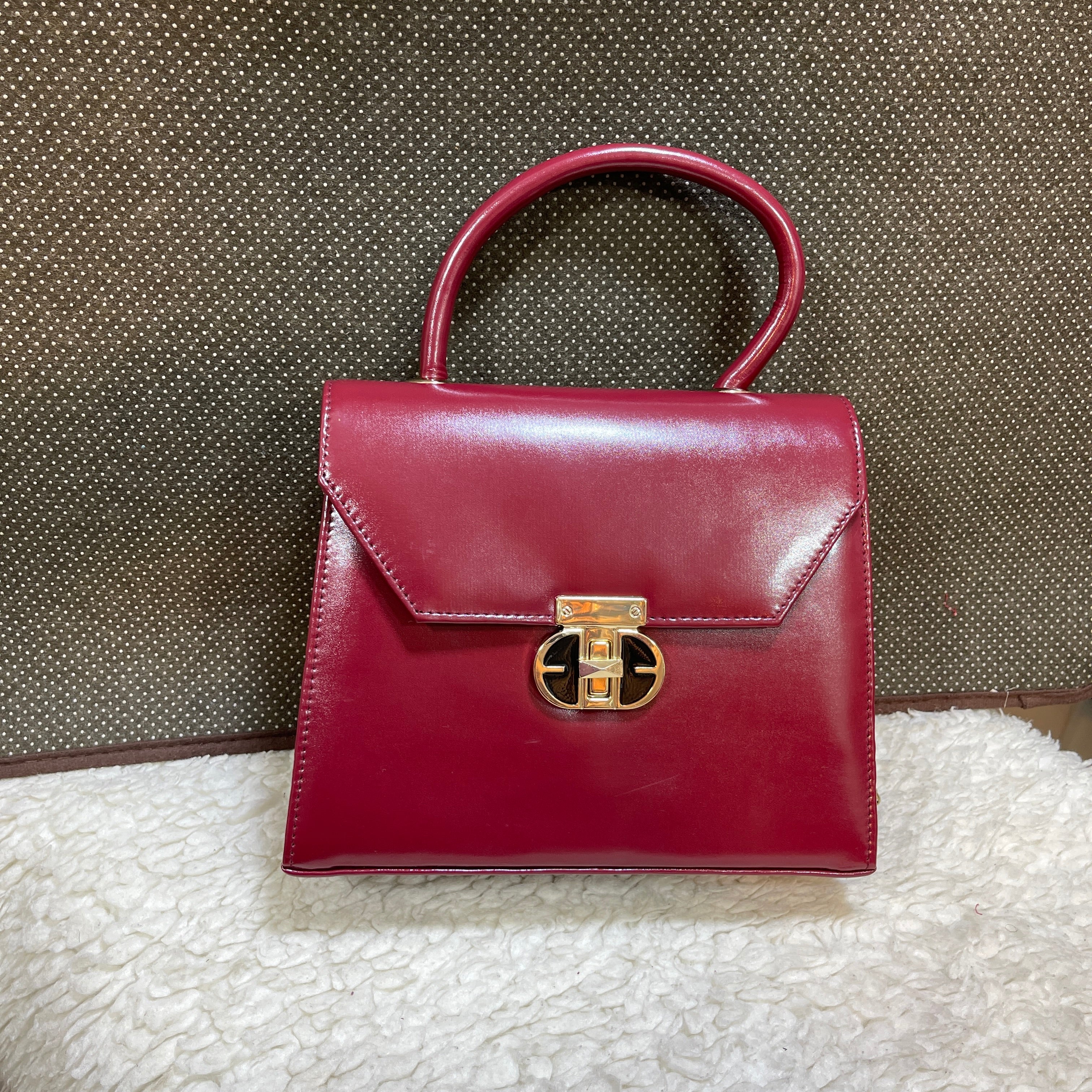 FLAPLOCK HANDBAGS